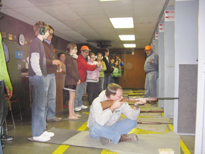 Students practicing at the live fire range during the 2012 youth firearms safety course.